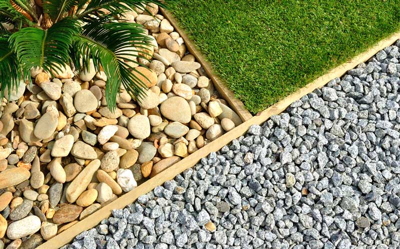 Overhead of grass rocks and gravel in landscape